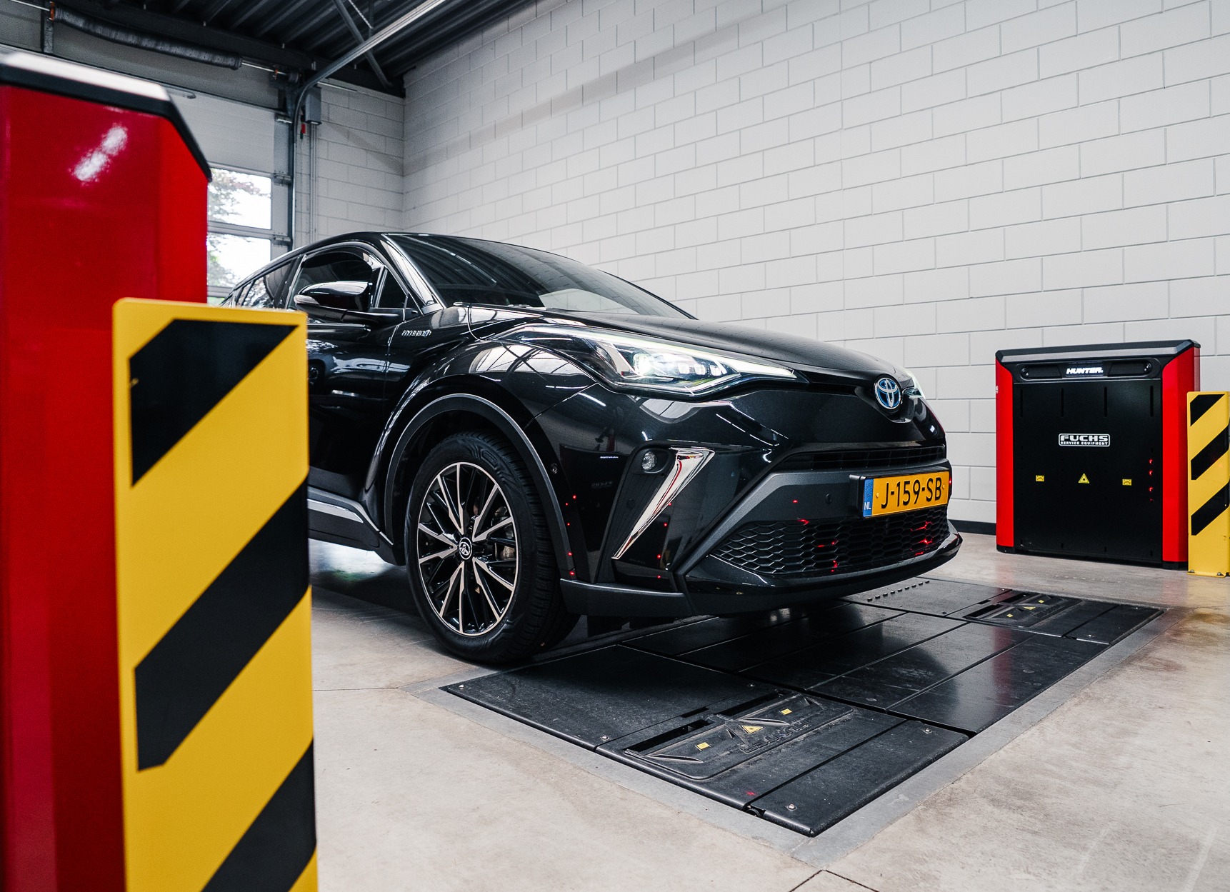 Content 39_content_image_17540532701456080266.jpg Hunter onderstelcontrole/diagnose | Van Gorp Auto’s